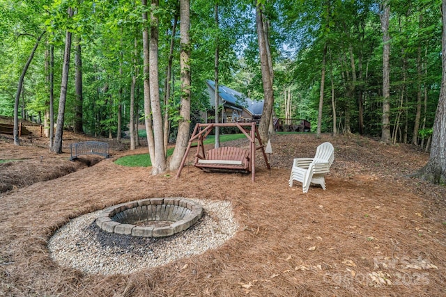 131 Sierra Woods Dr, Troutman, NC 28166 - view of yard featuring a fire pit