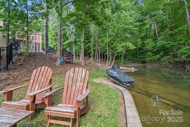 131 Sierra Woods Dr, Troutman, NC 28166 - view of yard with a water view and fence