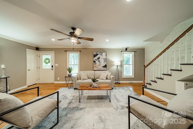 3387 Passmore Rd, Rock Hill, SC 29730 - living area with plenty of natural light, stairs, crown molding, baseboards, and wood finished floors