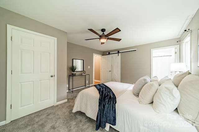 3387 Passmore Rd, Rock Hill, SC 29730 - bedroom featuring carpet, baseboards, a barn door, and ceiling fan