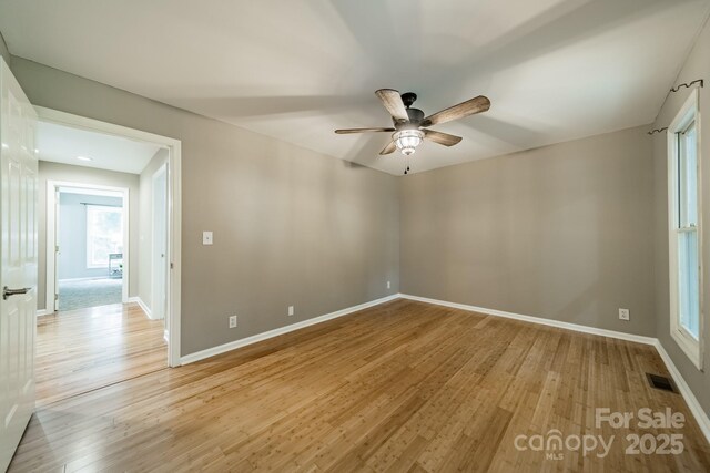 3387 Passmore Rd, Rock Hill, SC 29730 - unfurnished room featuring ceiling fan, light wood finished floors, and baseboards