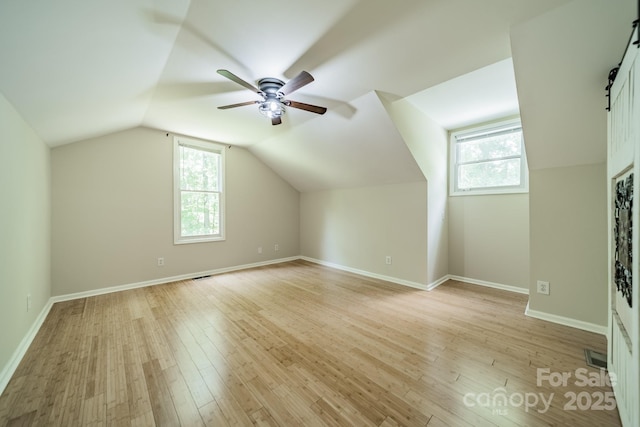 3387 Passmore Rd, Rock Hill, SC 29730 - additional living space featuring ceiling fan, healthy amount of natural light, light wood-style floors, lofted ceiling, and baseboards