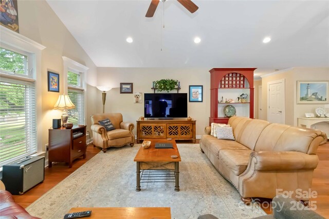 living room with ceiling fan, light wood-type flooring, lofted ceiling, and recessed lighting