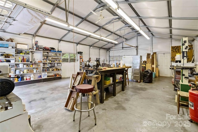 garage featuring a workshop area