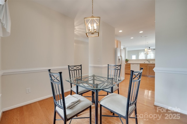 422 Garnet Ct, Fort Mill, SC 29708 - dining space featuring a chandelier, light wood-style floors, and recessed lighting