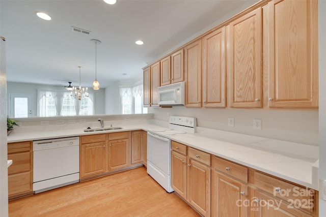 422 Garnet Ct, Fort Mill, SC 29708 - kitchen featuring white appliances, light wood-type flooring, light brown cabinets, recessed lighting, and pendant lighting