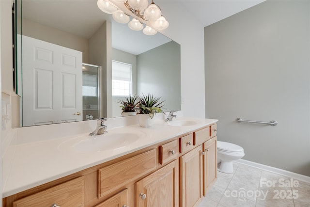422 Garnet Ct, Fort Mill, SC 29708 - full bathroom with double vanity, a shower with shower door, a chandelier, and tile patterned floors