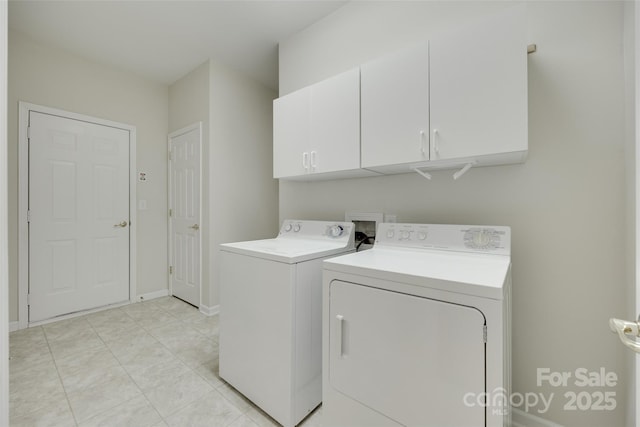 422 Garnet Ct, Fort Mill, SC 29708 - laundry area featuring washer and dryer and cabinet space