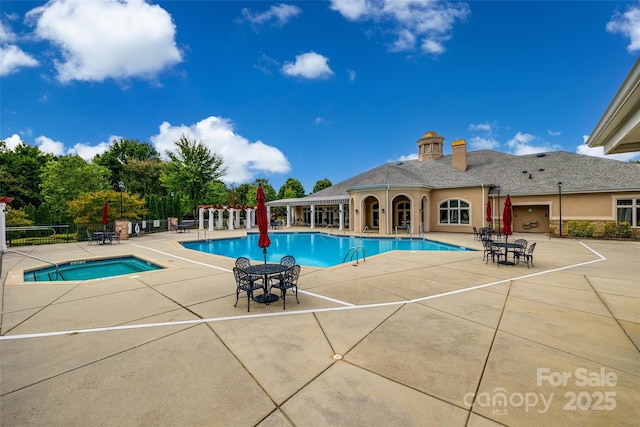 422 Garnet Ct, Fort Mill, SC 29708 - community pool featuring a patio area and a hot tub