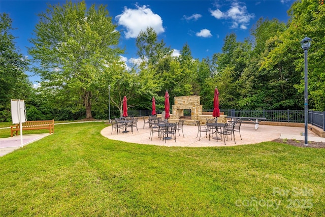 422 Garnet Ct, Fort Mill, SC 29708 - view of yard with an outdoor stone fireplace and a patio