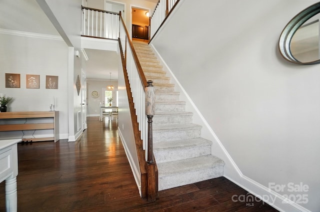 6314 Bluffton Ln, Midland, NC 28107 - stairs featuring ornamental molding, wood-type flooring, and baseboards