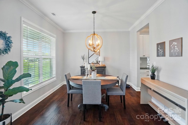 6314 Bluffton Ln, Midland, NC 28107 - dining area with a chandelier, dark wood finished floors, ornamental molding, and baseboards