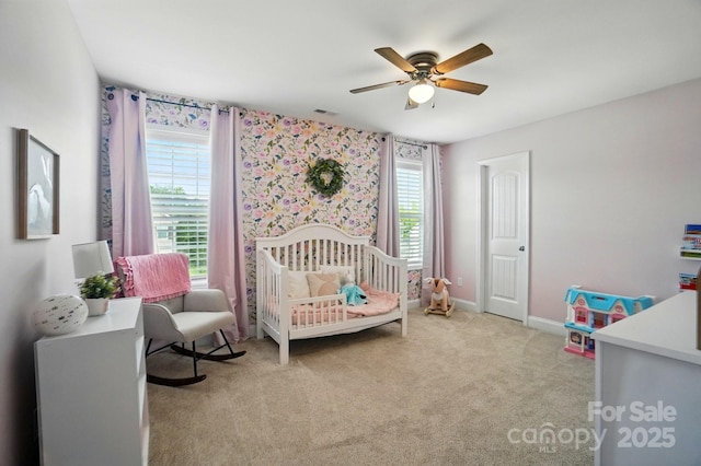6314 Bluffton Ln, Midland, NC 28107 - bedroom featuring carpet, a nursery area, baseboards, and a ceiling fan