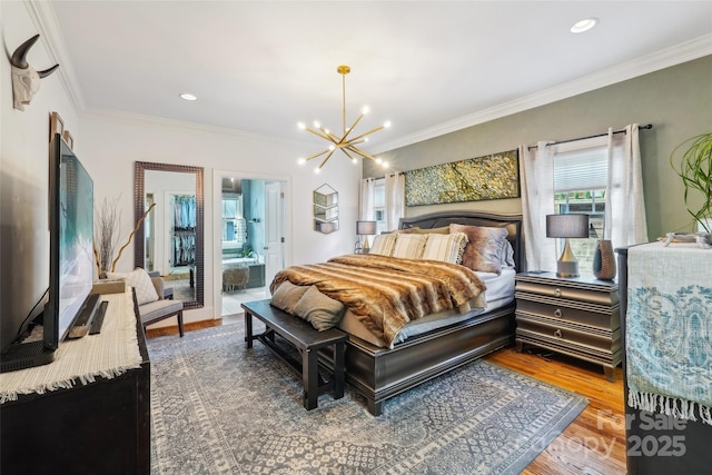 1701 Dearmon Dr, Charlotte, NC 28205 - bedroom featuring a chandelier, wood finished floors, ornamental molding, recessed lighting, and connected bathroom