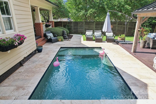 1701 Dearmon Dr, Charlotte, NC 28205 - view of pool with a fenced backyard and a patio
