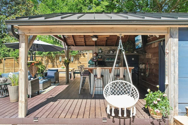 1701 Dearmon Dr, Charlotte, NC 28205 - wooden deck with an outdoor living space, fence, and a ceiling fan