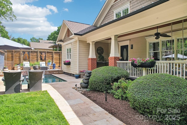1701 Dearmon Dr, Charlotte, NC 28205 - view of patio with a ceiling fan
