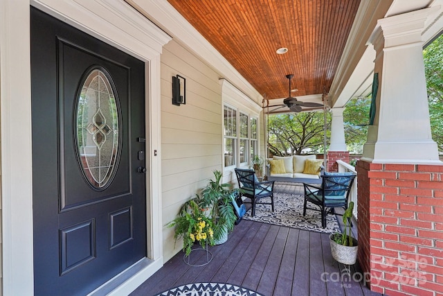 1701 Dearmon Dr, Charlotte, NC 28205 - property entrance with covered porch and a ceiling fan