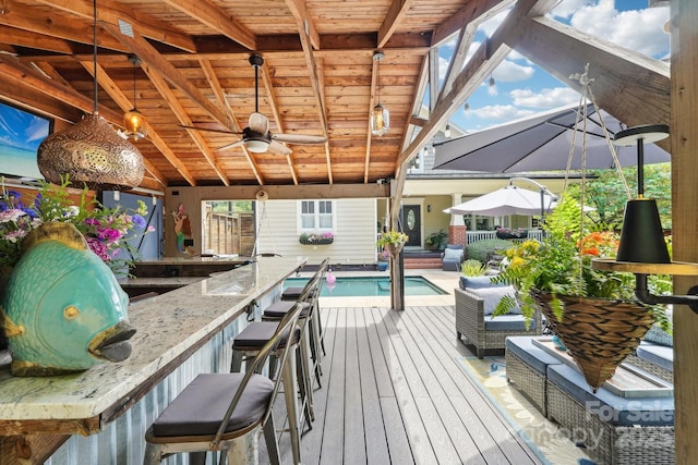 1701 Dearmon Dr, Charlotte, NC 28205 - wooden deck with an outdoor pool and ceiling fan