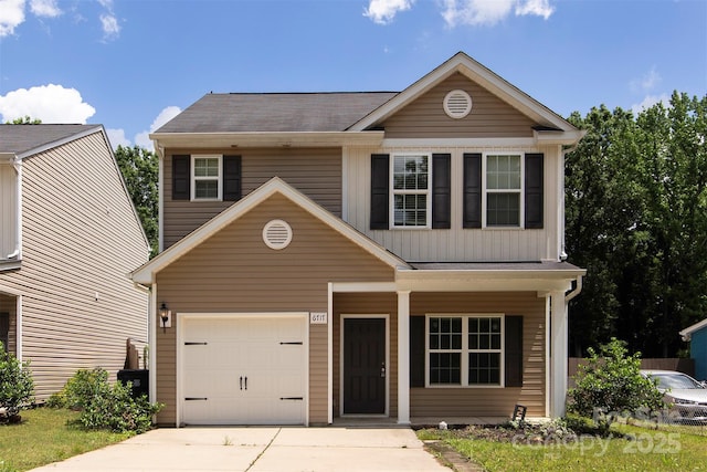 6717 Ware Rd, Charlotte, NC 28212 - view of front of house featuring concrete driveway, board and batten siding, a garage, and covered porch