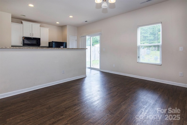 6717 Ware Rd, Charlotte, NC 28212 - unfurnished living room with ceiling fan, dark wood finished floors, baseboards, and recessed lighting