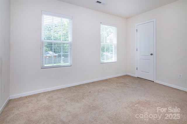 6717 Ware Rd, Charlotte, NC 28212 - carpeted spare room featuring baseboards