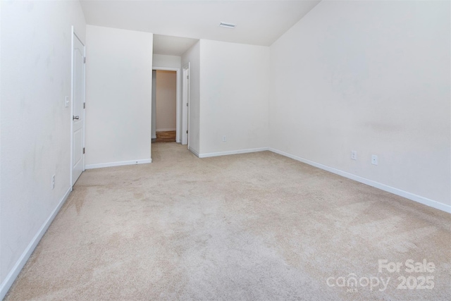 6717 Ware Rd, Charlotte, NC 28212 - carpeted spare room with baseboards