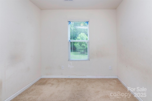 6717 Ware Rd, Charlotte, NC 28212 - spare room featuring carpet flooring and baseboards