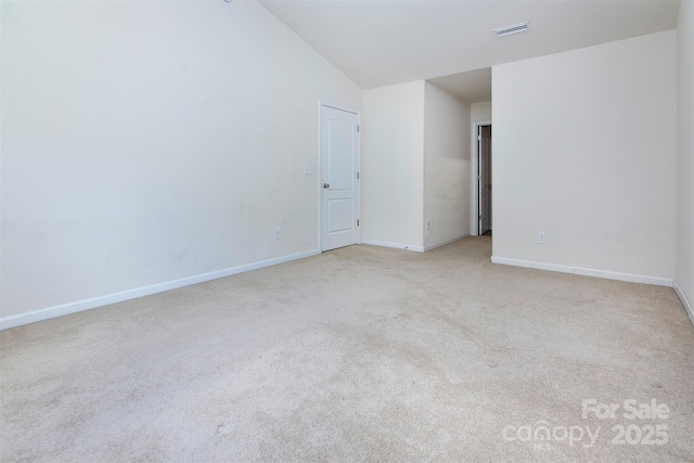 6717 Ware Rd, Charlotte, NC 28212 - carpeted empty room with lofted ceiling and baseboards