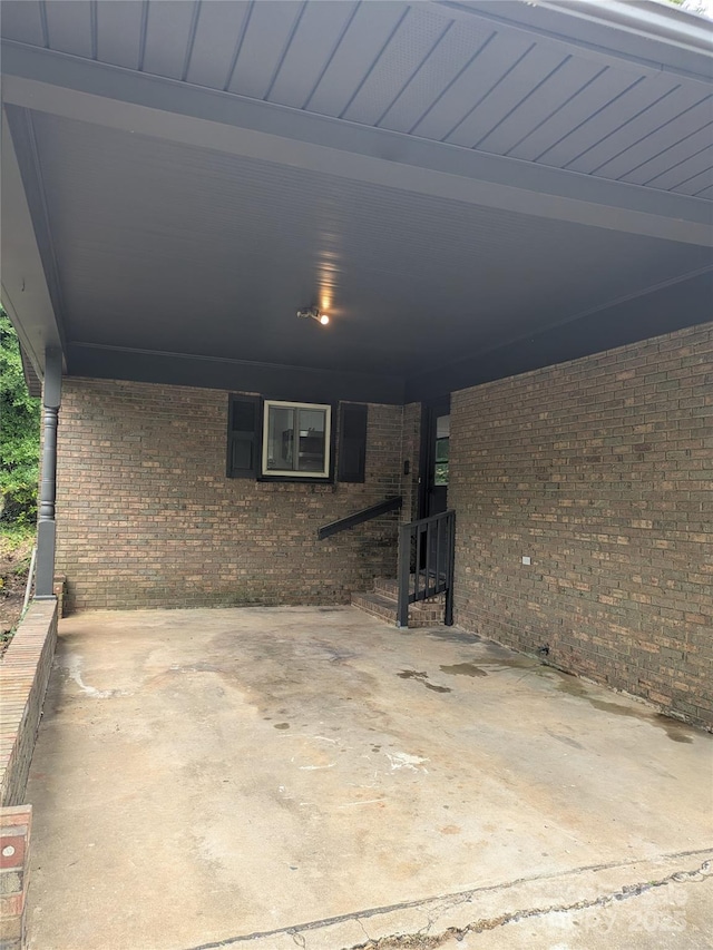 view of patio / terrace featuring a carport