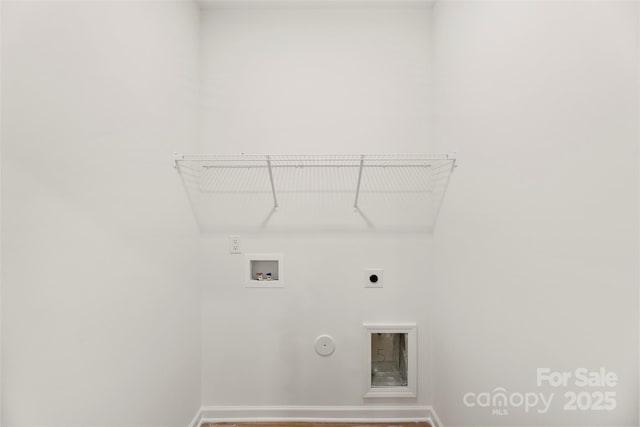 laundry area featuring hookup for a washing machine, electric dryer hookup, baseboards, and hookup for a gas dryer
