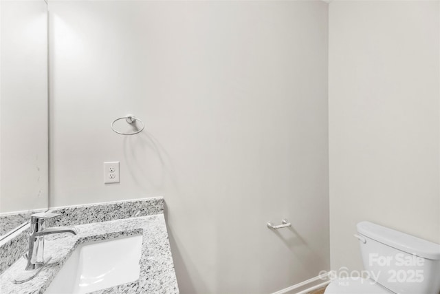 1411 Duhart Ave, Gastonia, NC 28054 - bathroom featuring toilet and vanity