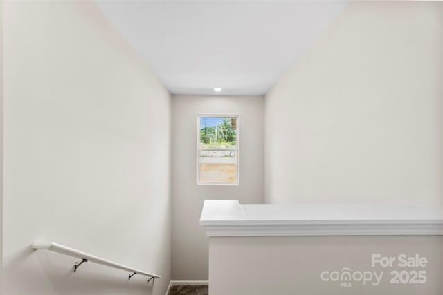 stairs with carpet flooring and baseboards