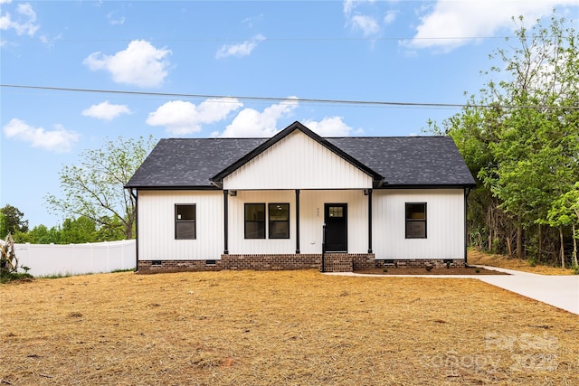 605 Stirewalt Rd, China Grove, NC 28023 - view of front of property featuring crawl space, roof with shingles, fence, and covered porch