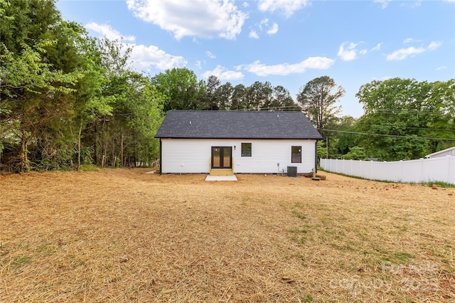 605 Stirewalt Rd, China Grove, NC 28023 - rear view of house featuring central AC, fence, and french doors