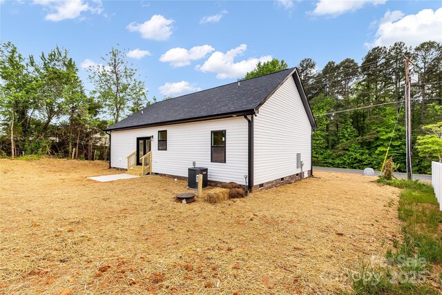 605 Stirewalt Rd, China Grove, NC 28023 - view of property exterior with entry steps, crawl space, roof with shingles, and central AC unit