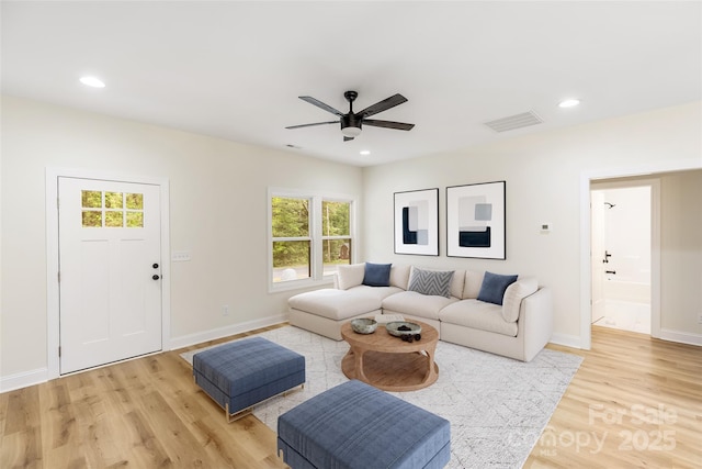 605 Stirewalt Rd, China Grove, NC 28023 - living area featuring healthy amount of natural light, light wood finished floors, ceiling fan, baseboards, and recessed lighting