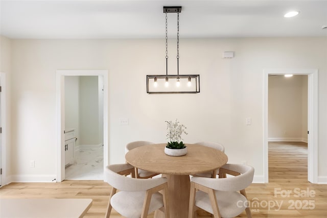 605 Stirewalt Rd, China Grove, NC 28023 - dining space featuring light wood-style floors, recessed lighting, and baseboards