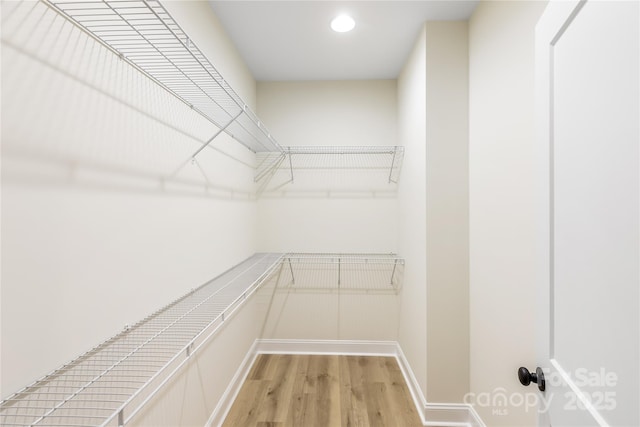 605 Stirewalt Rd, China Grove, NC 28023 - walk in closet with wood finished floors