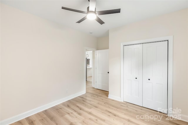 605 Stirewalt Rd, China Grove, NC 28023 - unfurnished bedroom featuring light wood-style floors, baseboards, a closet, and ceiling fan