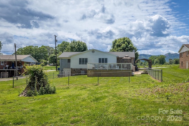 107 Pete Brittain Rd, Morganton, NC 28655 - back of property with a carport, a wooden deck, and crawl space