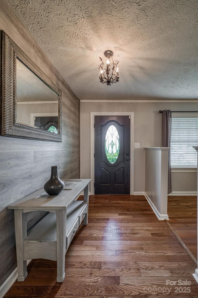 107 Pete Brittain Rd, Morganton, NC 28655 - entryway featuring a chandelier, healthy amount of natural light, a textured ceiling, and wood finished floors