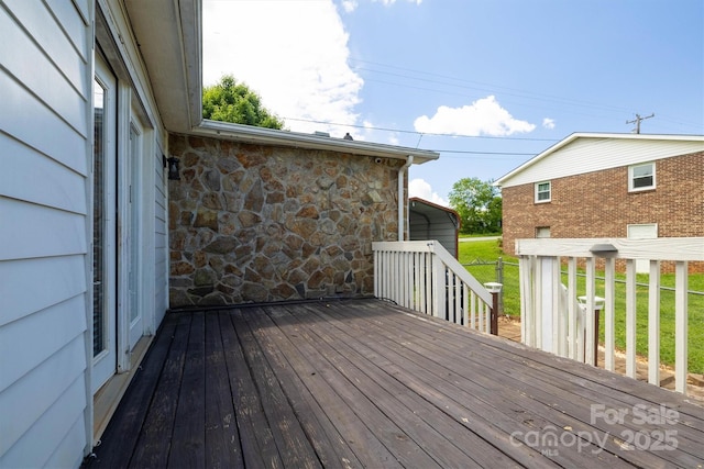 107 Pete Brittain Rd, Morganton, NC 28655 - deck featuring a detached carport and a lawn