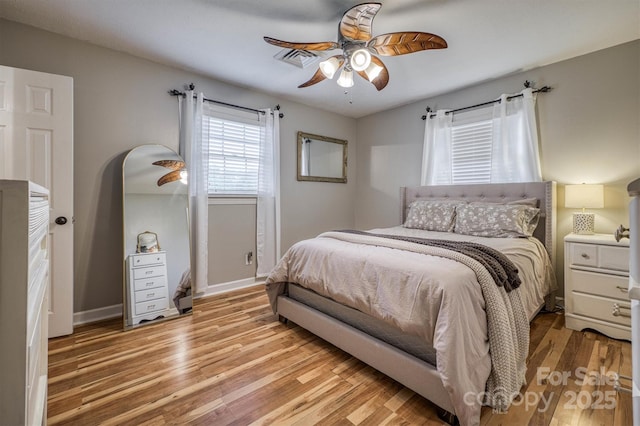 107 Pete Brittain Rd, Morganton, NC 28655 - bedroom with light wood-type flooring, baseboards, and ceiling fan