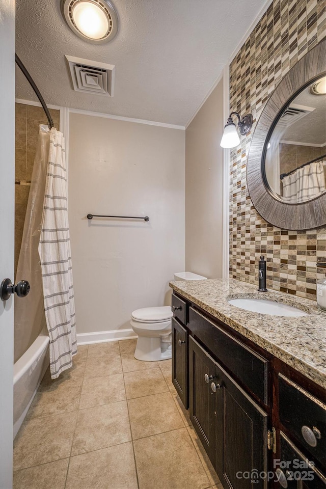 107 Pete Brittain Rd, Morganton, NC 28655 - bathroom featuring tasteful backsplash, toilet, tile patterned flooring, vanity, and ornamental molding