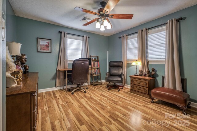 107 Pete Brittain Rd, Morganton, NC 28655 - office area with light wood-style floors, a ceiling fan, and baseboards