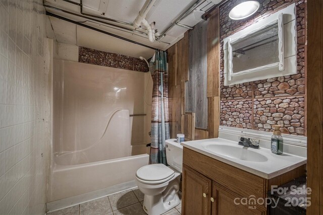 107 Pete Brittain Rd, Morganton, NC 28655 - bathroom with toilet, shower / bathtub combination with curtain, tile patterned floors, and vanity