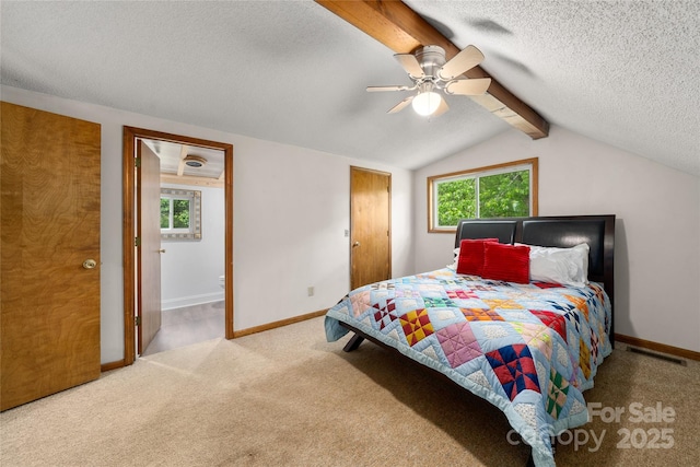 234 Snyder Farm Rd, Waynesville, NC 28786 - bedroom featuring carpet floors, multiple windows, a textured ceiling, baseboards, and a ceiling fan