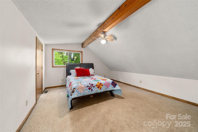 234 Snyder Farm Rd, Waynesville, NC 28786 - carpeted bedroom featuring baseboards, a textured ceiling, and a ceiling fan