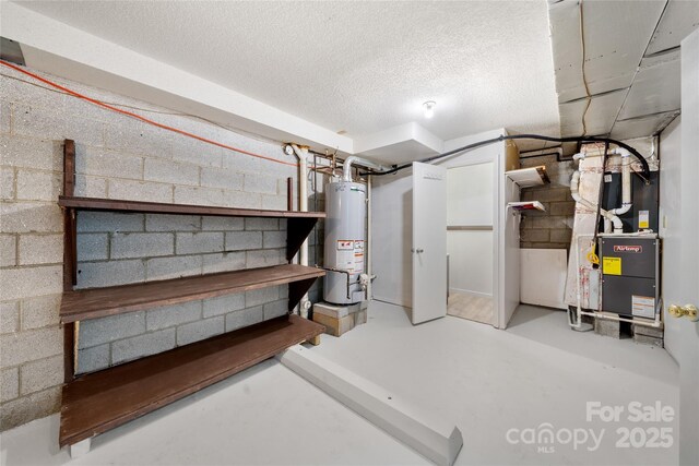 234 Snyder Farm Rd, Waynesville, NC 28786 - unfinished below grade area with gas water heater, concrete block wall, heating unit, and a textured ceiling